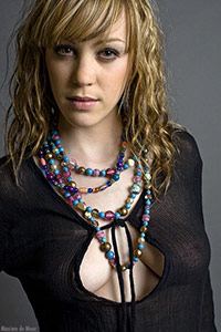 Tunique en voile de coton noir, décolleté profond